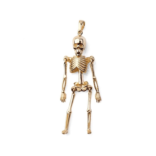 394 - 9ct gold pendant in the form of an anatomical skeleton. 2.4 grams. 4.5cm tall.