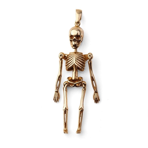 395 - 9ct gold pendant in the form of an anatomical skeleton. 2.4 grams. 4.5cm tall.