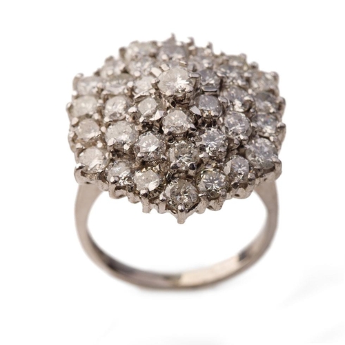 411 - 18ct white gold diamond cluster ring, set with circa 3.7ct of diamond stones, 37 diamonds, 9.37 gram... 