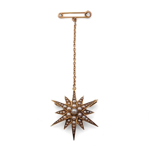 412 - 15ct gold star brooch set with seed pearls with safety chain, 5.0 grams.