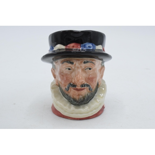 137 - Royal Doulton rare small character jug Beefeater with yellow writing and cypher 'GR'.