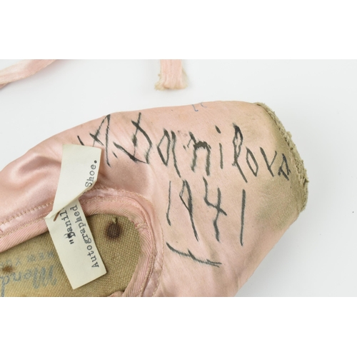 173 - Alexandra Danilova: a 1940s pink ballet pointe shoe, signed by Danilova 'To Cliff A. Danilova 1941',... 