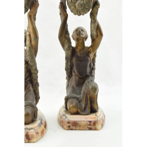 253 - A pair of French Art Deco spelter figures in the form of Joan of Arc, inspired by La Belle, mounted ... 