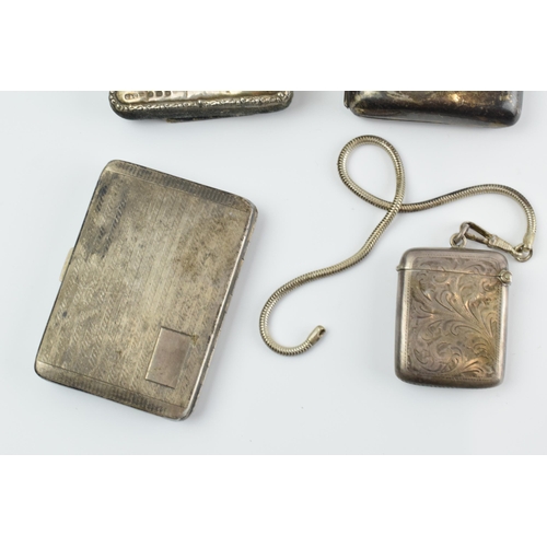 289 - Silver items to include a vesta case Chester 1915, 2 cigarette cases, silver weight 161.0 grams, a s... 