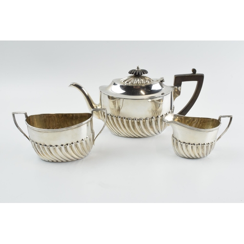 291 - Hallmarked silver tea set to include a teapot, milk and sugar bowl, 388.0 grams / 12.48 oz gross wei... 