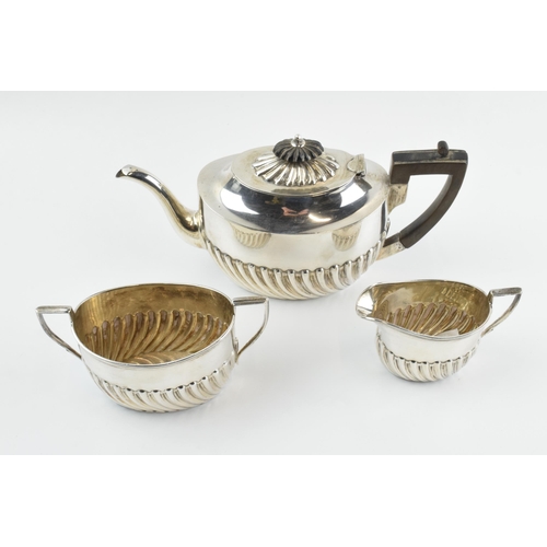 291 - Hallmarked silver tea set to include a teapot, milk and sugar bowl, 388.0 grams / 12.48 oz gross wei... 