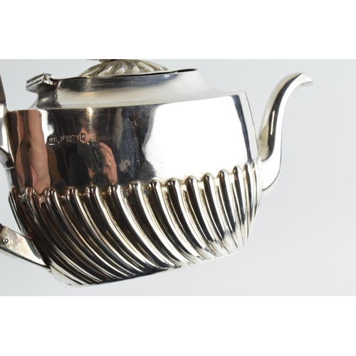 291 - Hallmarked silver tea set to include a teapot, milk and sugar bowl, 388.0 grams / 12.48 oz gross wei... 