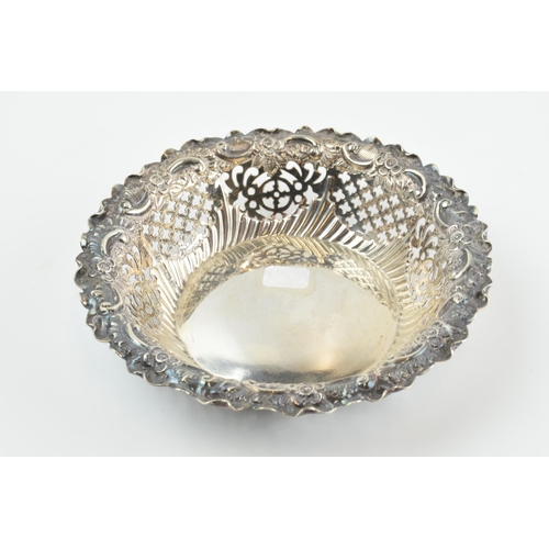 295 - Hallmarked silver ornate pierced bonbon dish, 58.2 grams / 1.87 oz, 11.5cm diameter, Sheffield 1894.