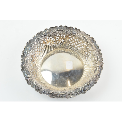 295 - Hallmarked silver ornate pierced bonbon dish, 58.2 grams / 1.87 oz, 11.5cm diameter, Sheffield 1894.