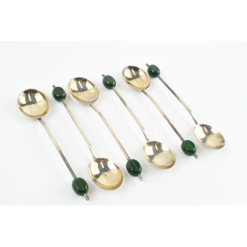 299 - A set of 6 silver tea spoons with coffee bean finials, 39.3 grams, Birmingham 1932 (6).