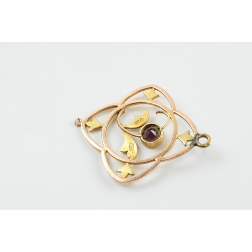 378 - Edwardian 9ct gold pendant set with a garnet and pearls, 1.9 grams, 3cm long.