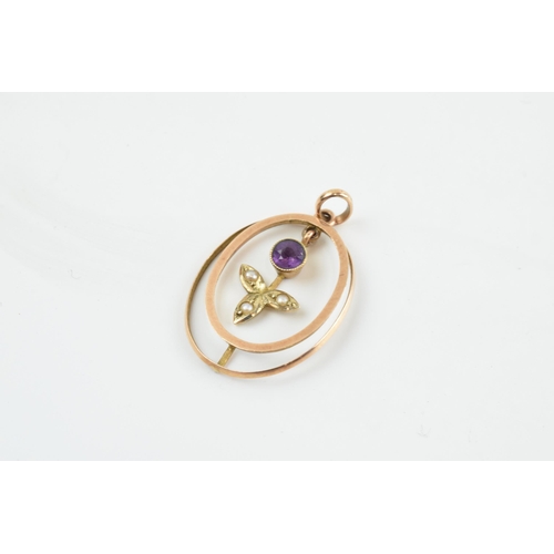 380 - Edwardian 9ct gold pendant set with an amethyst and seed pearls, 1.1 grams, 2.5cm long.