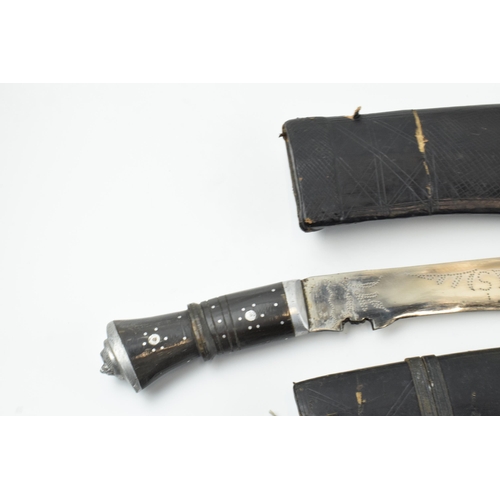 449 - 20th century Gurkha style Kukri knife in black leather scabbard together with smaller example (2),  ... 