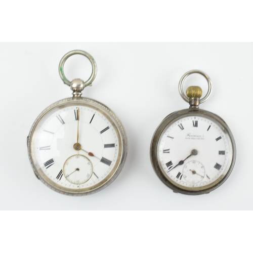 471 - A pair of sterling silver pocket watches to include a 5cm diameter example, London 1887, and a Freem... 