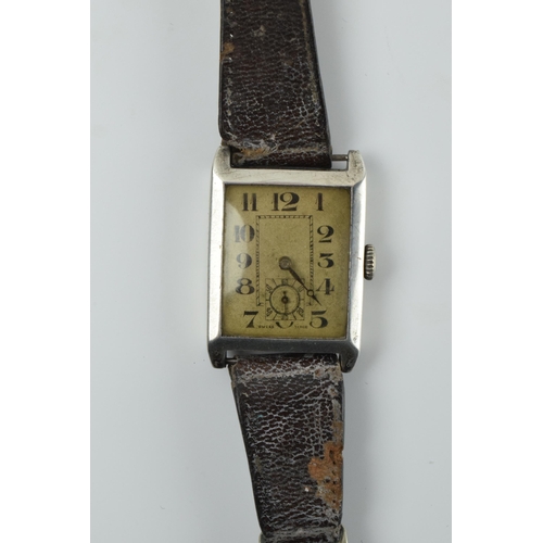 476 - Early to mid 20th century sterling silver gentleman's wristwatch with subsidiary dial, marked to rev... 