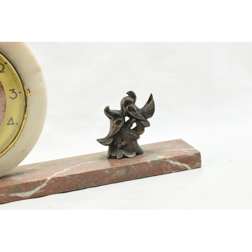 494 - French Art Deco mantle clock with a pair of doves, 42cm long.