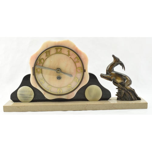 495 - French Art Deco mantle clock with rearing gazelle garniture, 45cm long.