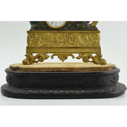 497 - 19th century continental gilt metal mantle clock of a soldier falling onto his own sword, on ebonise... 