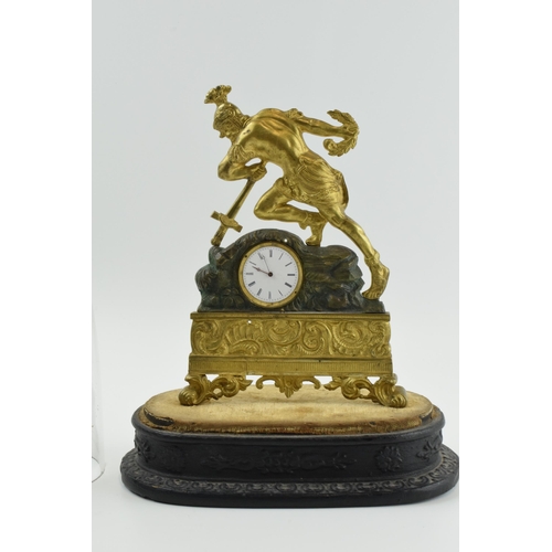 497 - 19th century continental gilt metal mantle clock of a soldier falling onto his own sword, on ebonise... 