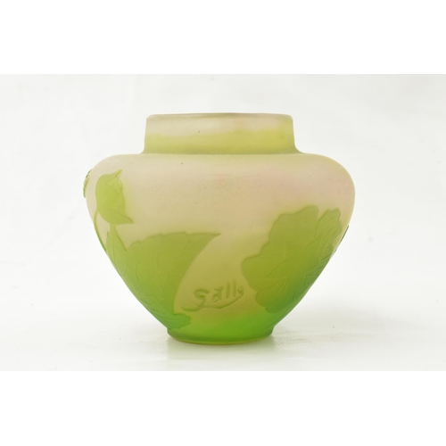 75 - Galle glass vase in green and opaque glass, with floral decoration, signed, height 6cm.