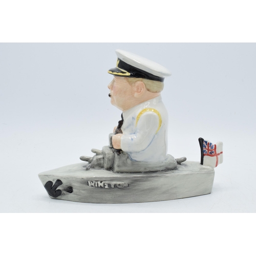 76 - Bairstow Manor Collectables comical model of Winston Churchill in a boat, 18cm tall.