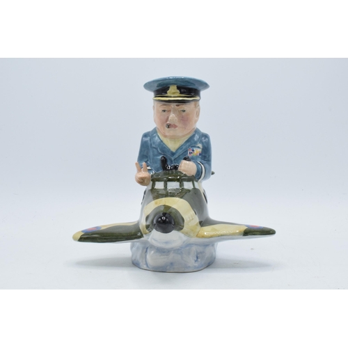 78 - Bairstow Manor Collectables comical model of Winston Churchill in a spitfire, 20cm tall.