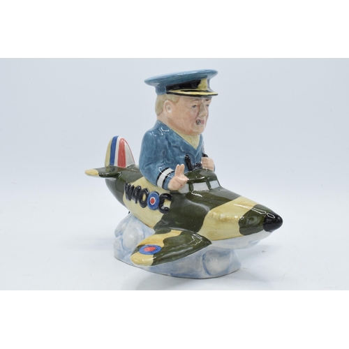 78 - Bairstow Manor Collectables comical model of Winston Churchill in a spitfire, 20cm tall.