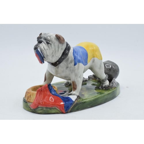 81 - Bairstow Manor Collectables political model of a Ukranian bulldog tearing a Russian flag apart, 20cm... 