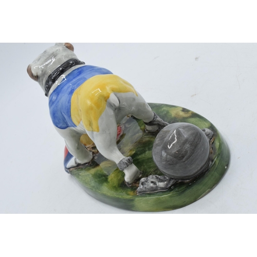 81 - Bairstow Manor Collectables political model of a Ukranian bulldog tearing a Russian flag apart, 20cm... 