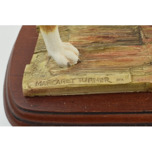 100 - Border Fine Arts Margaret Turner standing boxer dog, on wooden base, 31cm long.