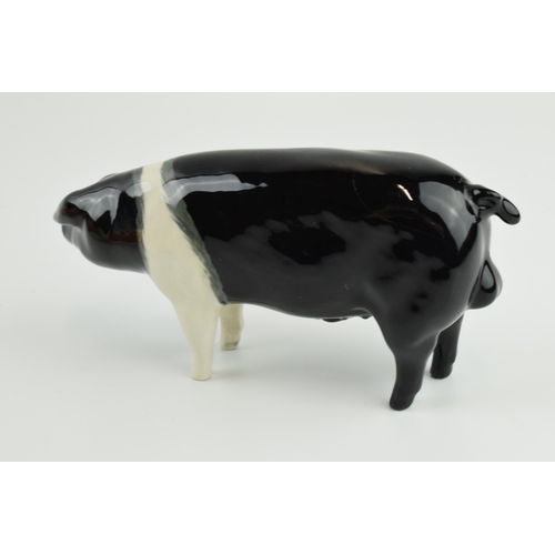 116 - Beswick Saddleback boar 1512 (crack to rear).