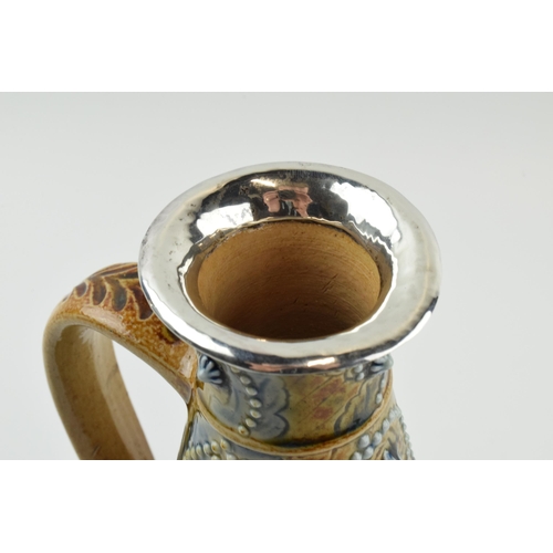 125 - Doulton Lambeth stoneware jug, 1874, of baluster form with white metal mount, signed Emily J Edwards... 