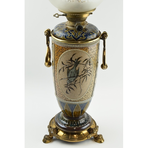 129 - Doulton Lambeth Florence Barlow stoneware oil lamp base with brass tri-leg stand in the form of hoof... 