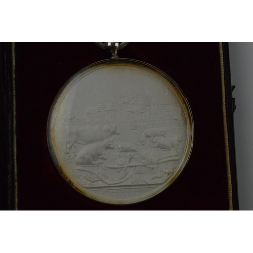 177 - Cased 'Liverpool and Manchester Agricultural Society' medallion, dated 8th September 1854, in white ... 