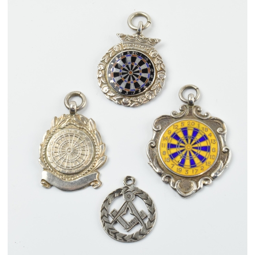 300 - A quartet of silver fobs to include a masonic charm and darts fobs (4), 29.4 grams.