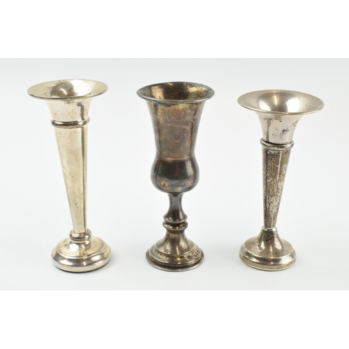 301 - A trio of singular silver vases to include a pedestal vase and trumpet vases (loaded bases), gross w... 