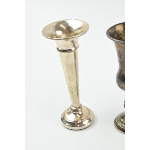 301 - A trio of singular silver vases to include a pedestal vase and trumpet vases (loaded bases), gross w... 