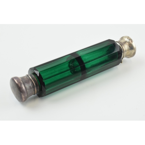 305 - Late 19th century green glass double ended scent bottle with silver mounts, unmarked but test as sil... 