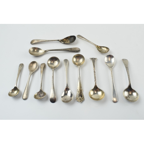 310 - A good collection of silver condiment spoons of varying forms, sizes and ages, 58.4 grams (12).