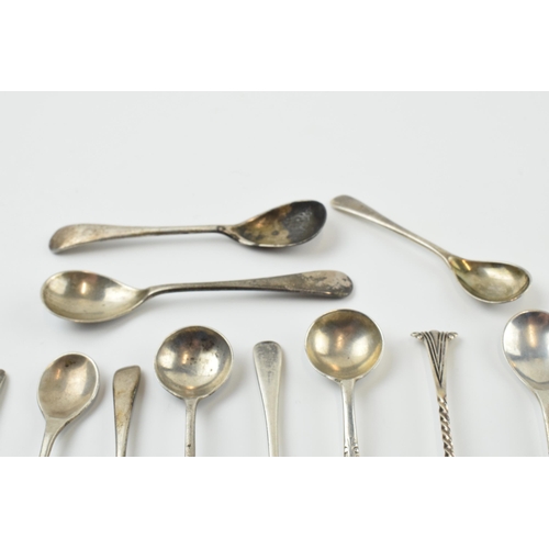 310 - A good collection of silver condiment spoons of varying forms, sizes and ages, 58.4 grams (12).