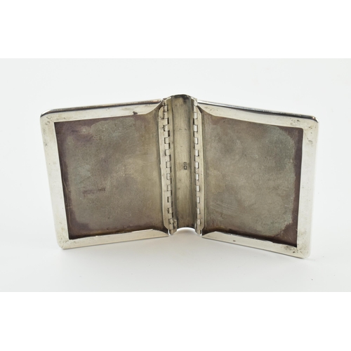 311 - Hallmarked silver novelty photo frame in the form of a book, 63 grams, Birmingham 1902, 6cm tall.