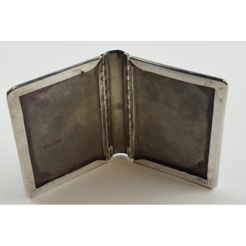 311 - Hallmarked silver novelty photo frame in the form of a book, 63 grams, Birmingham 1902, 6cm tall.