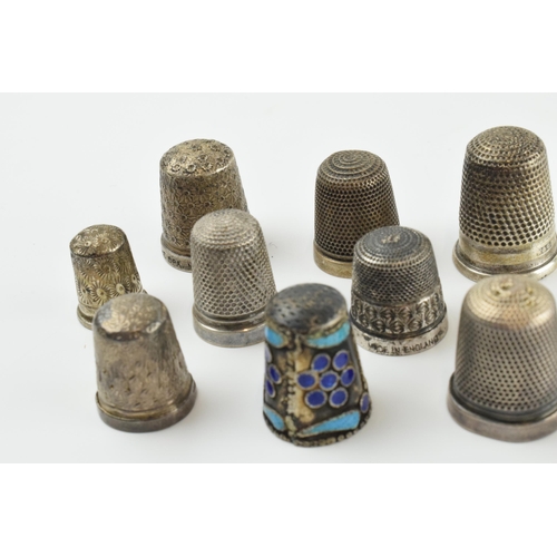 315 - A collection of sterling silver thimbles, one with enamelled decoration, mostly hallmarked, 34.4 gra... 