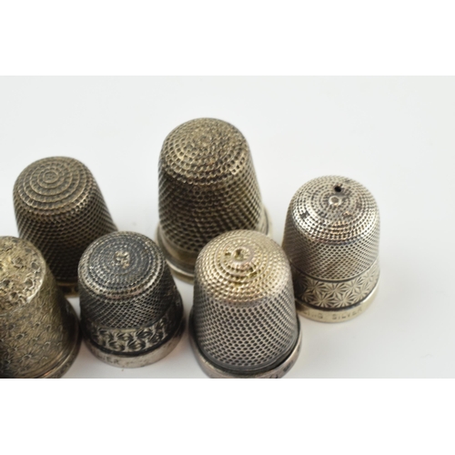 315 - A collection of sterling silver thimbles, one with enamelled decoration, mostly hallmarked, 34.4 gra... 