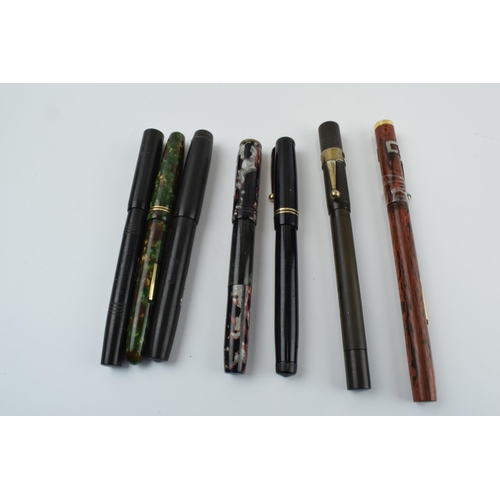 386 - A collection of fountain pens with 14ct gold nibs to include makes such as Burnham, Swan, Jackdaw an... 