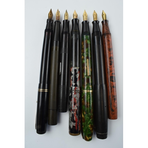 386 - A collection of fountain pens with 14ct gold nibs to include makes such as Burnham, Swan, Jackdaw an... 