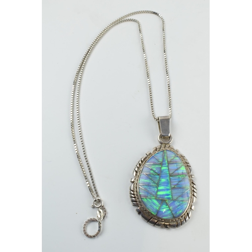 392 - Sterling silver necklace with opal set pendant 'DT @' and 'Sterling' to rear, chain 56cm long, penda... 