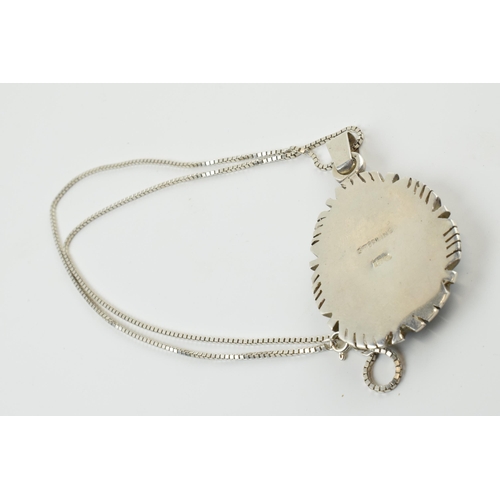 392 - Sterling silver necklace with opal set pendant 'DT @' and 'Sterling' to rear, chain 56cm long, penda... 