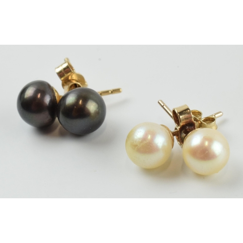 396 - 9ct gold black Tahitian pearl earrings together with white pearl earrings (2 pairs), 2.8 grams.