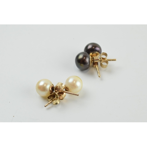 396 - 9ct gold black Tahitian pearl earrings together with white pearl earrings (2 pairs), 2.8 grams.